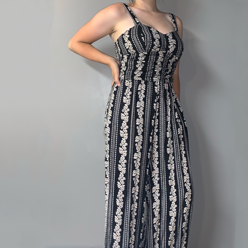 Black Jumpsuit With Floral Stripes